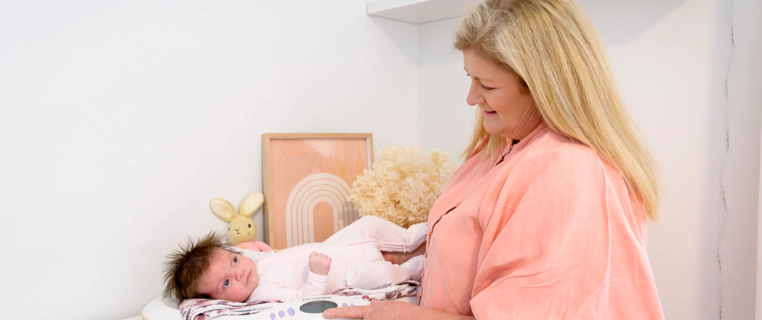 Private midwife Kate caring for a newborn